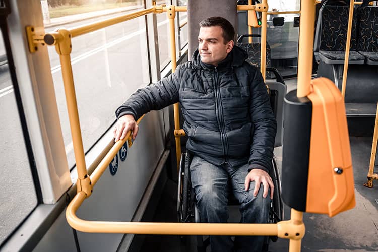 Disabled man on bus in North Wales